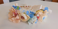 Couronne de fleurs ( fausses fleurs ) pour ceremonie · vue 3