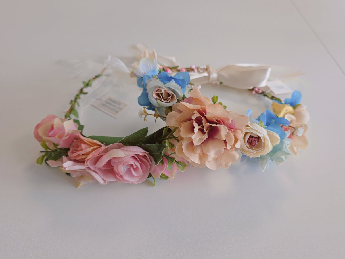 Couronne de fleurs ( fausses fleurs ) pour ceremonie