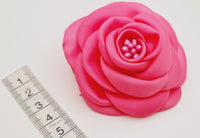 Broche camelia rose fushia · vue 2