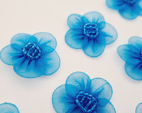 Petites fleurs bleu turquoise par 10 · vue 2