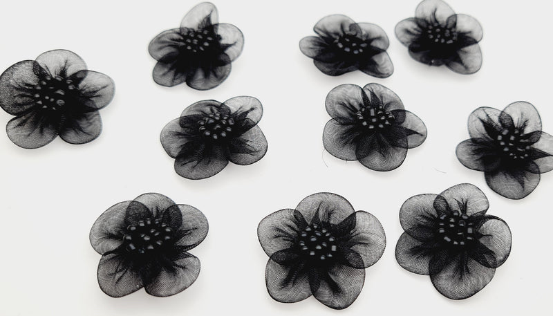 Petites fleurs noires