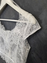 Top mariée dentelle ivoire clair – Manches courtes – Dos boutonné – Taille 36 · vue 7