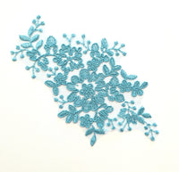 Motif en dentelle bleu turquoise