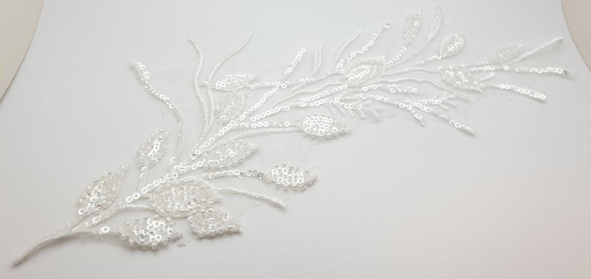 Long motif feuilles pour robe de mariée sequins