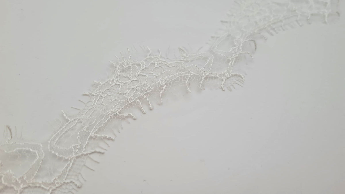 Dentelle fine francaise ivoire pour robe de mariée