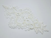Motif pour robe de mariée princesse ivoire perles et détails argenté T915