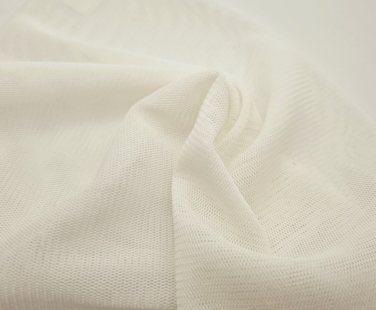 Maille de tulle ivoire stretch laize 155