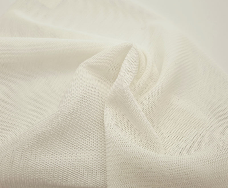 Maille de tulle ivoire stretch laize 155