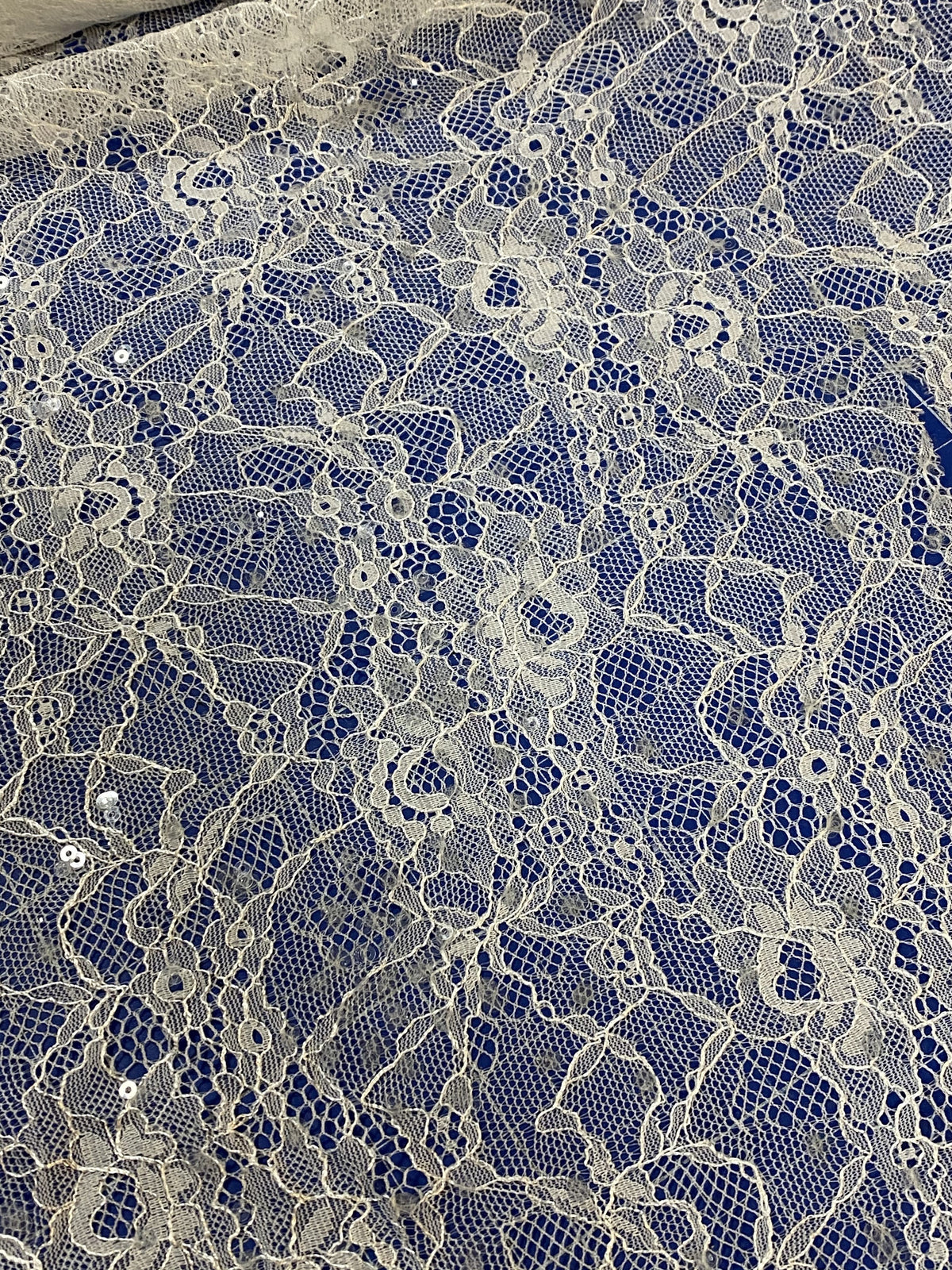 Dentelle pour robe de mariée avec sequins ivoire/blanc