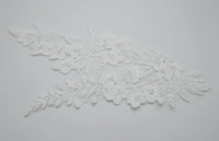 Motif ivoire clair dentelle avec perles et sequins