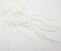 Motif ivoire dentelle et plumes pour robe de mariée