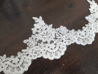 Galon de dentelle blanc bord festonné