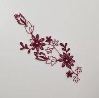 Motif rouge bordeaux fleurs à coudre