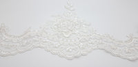 Galon de dentelle ivoire fil argenté sequins