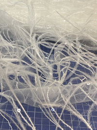 TULLE avec plumes et sequins pour création · vue 3