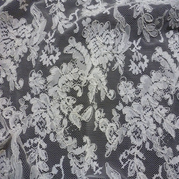 Dentelle rebrodée blanc ou ivoire