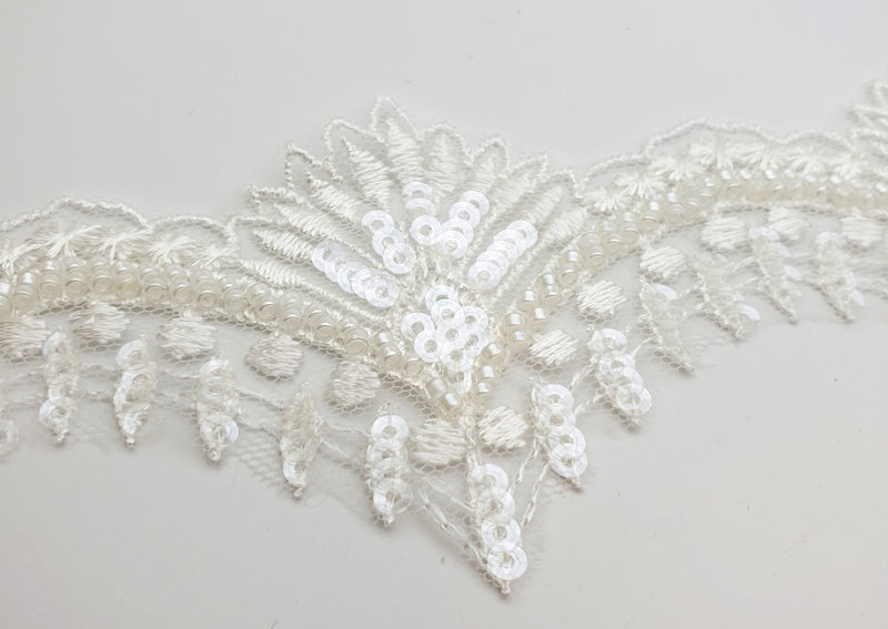 Galon ivoire pour robe de mariée orné de sequins