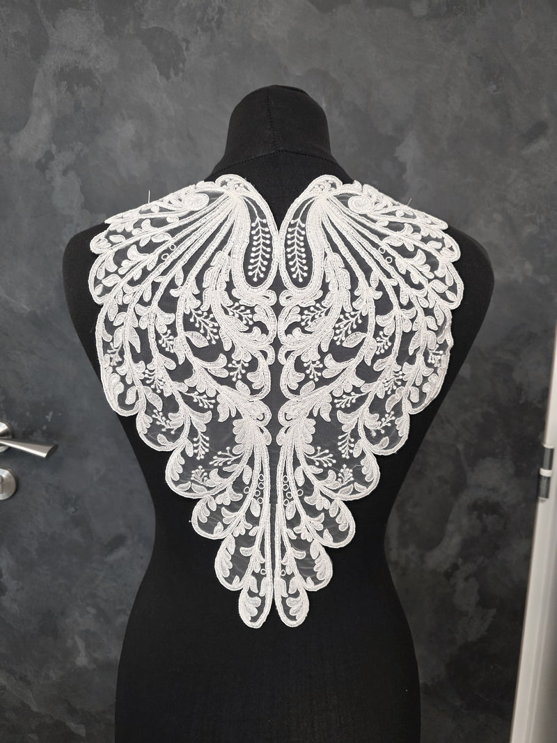 Motif dos en dentelle ivoire pour dos de robe de mariée