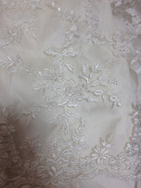 Dentelle rebrodée ivoire nacrée laize 140 · vue 2