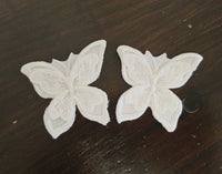 2 motifs papillons à coudre ivoire