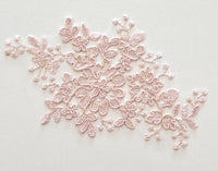 Motif dentelle rose poudré nacré