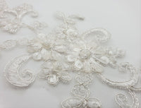 Motif fleurs perles et sequins blanc/ivoire pour robe de mariée