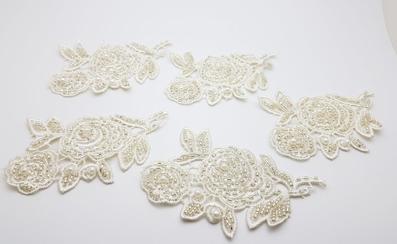 Appliqués motifs à coudre ivoire et silver lot par 5