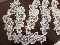 Lot unique de 7 motifs ivoire avec perles et arabesques